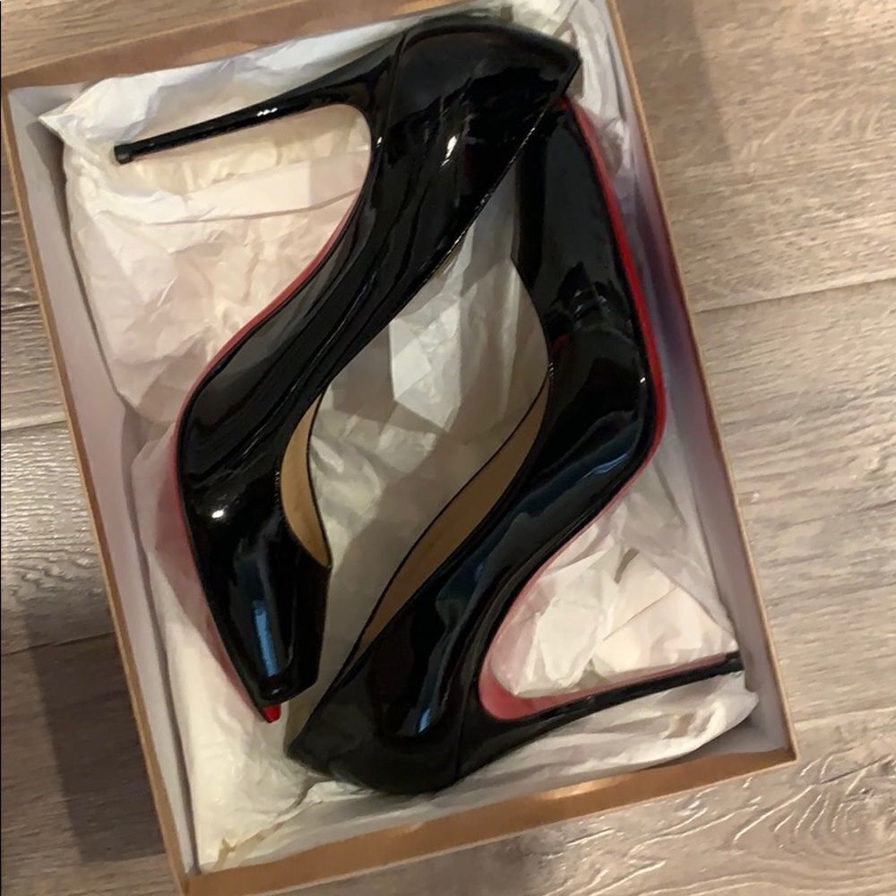 Authentic Christian Louboutin open toe pump